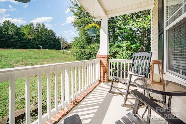 balcony featuring a porch