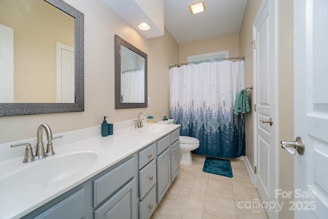 bathroom featuring vanity, a shower with curtain, tile patterned floors, and toilet