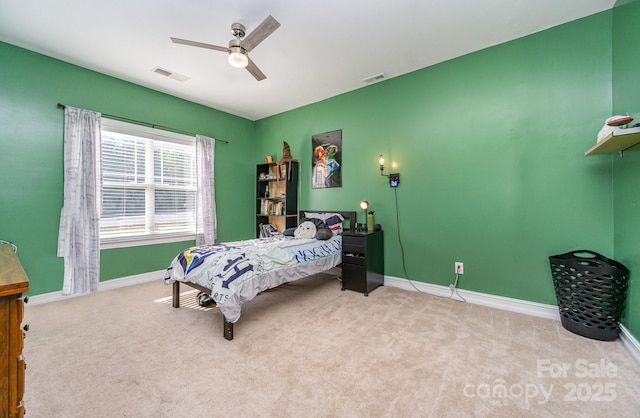 carpeted bedroom with ceiling fan