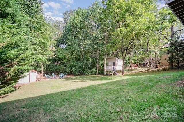 121 Canvasback Rd, Mooresville, NC 28117 - view of grassy yard featuring a shed
