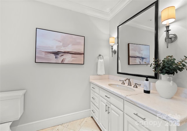 bathroom featuring crown molding, vanity, tile patterned floors, and toilet