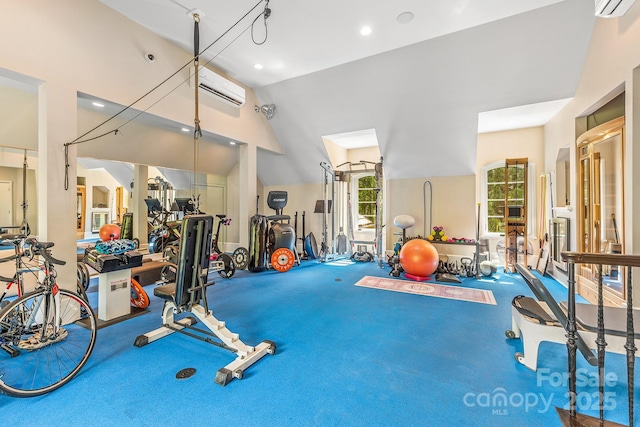 exercise room with a wall mounted AC, high vaulted ceiling, and carpet