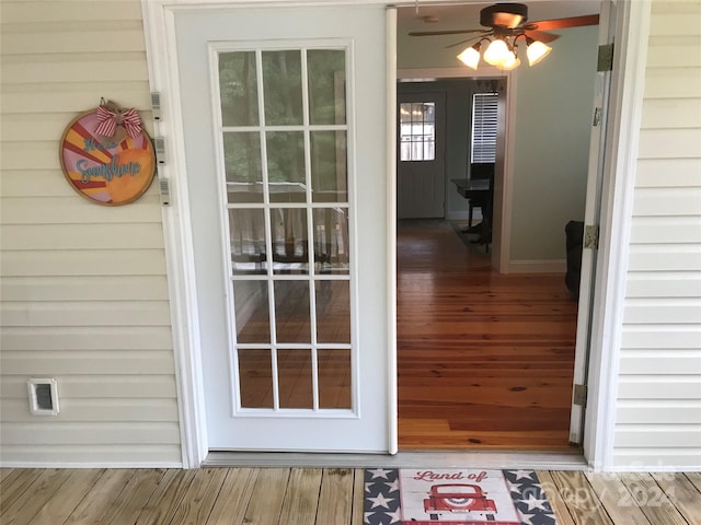 interior space featuring ceiling fan and hardwood / wood-style floors