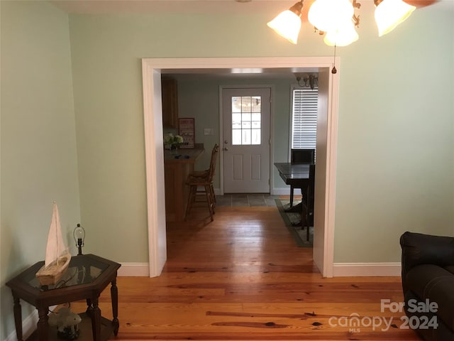 hallway featuring hardwood / wood-style floors