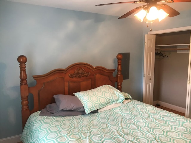 bedroom featuring ceiling fan and a closet