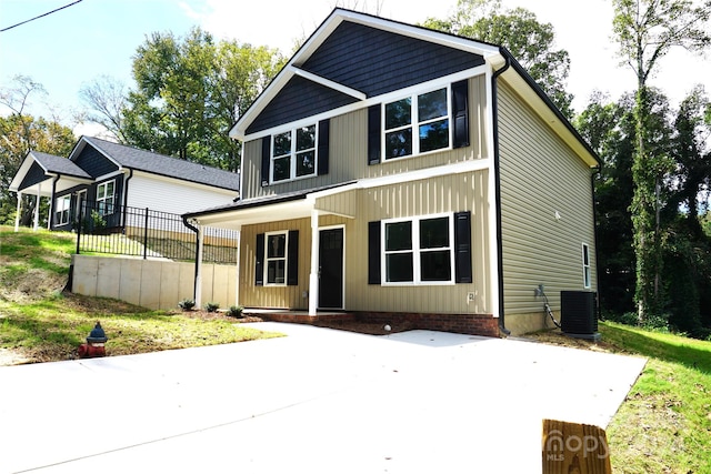 view of front of home featuring cooling unit