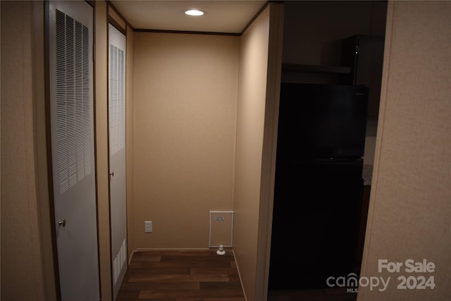 hallway featuring dark wood-type flooring