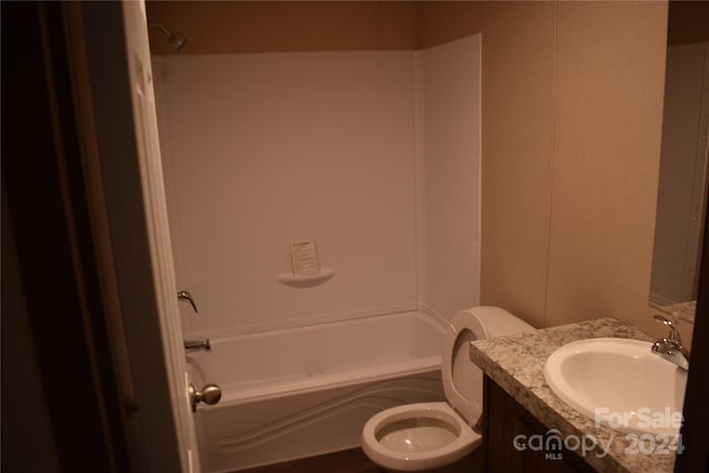 full bathroom featuring vanity, shower / bathing tub combination, and toilet