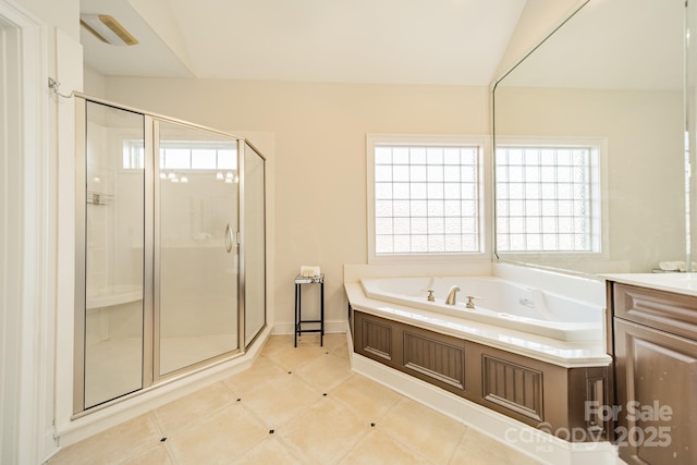 bathroom featuring lofted ceiling, vanity, separate shower and tub, and tile patterned floors