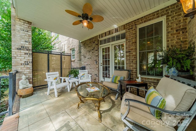 view of patio featuring outdoor lounge area and ceiling fan