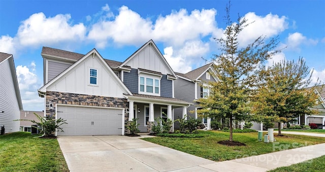 view of front of house with a porch, a garage, and a front yard