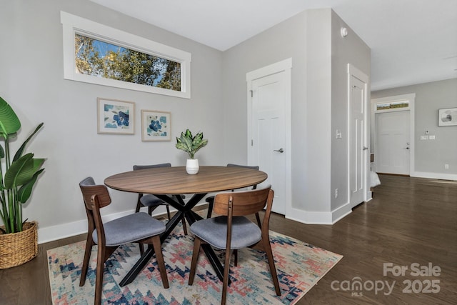 dining room featuring dark hardwood / wood-style floors