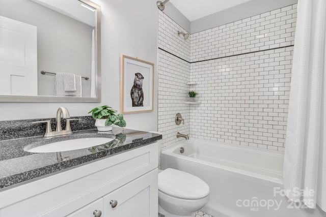 full bathroom featuring vanity, shower / tub combo, and toilet