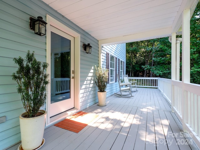 deck with covered porch