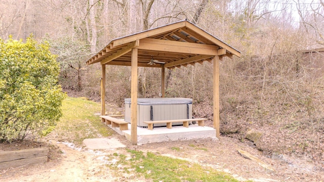 view of property's community with a hot tub