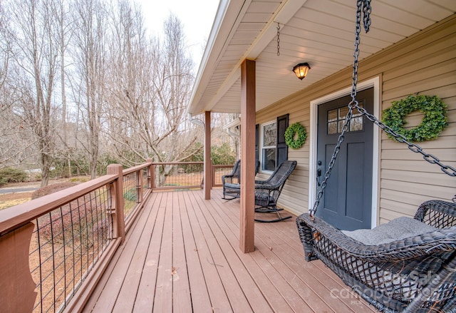 wooden terrace with covered porch