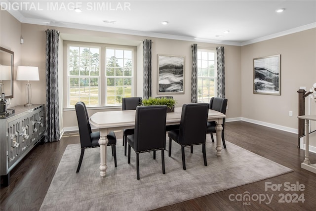 dining area with crown molding and dark wood-type flooring