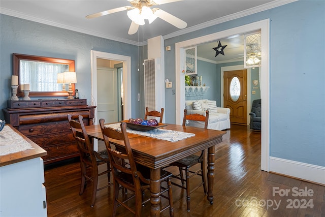 dining space featuring ceiling fan, dark hardwood / wood-style floors, and crown molding