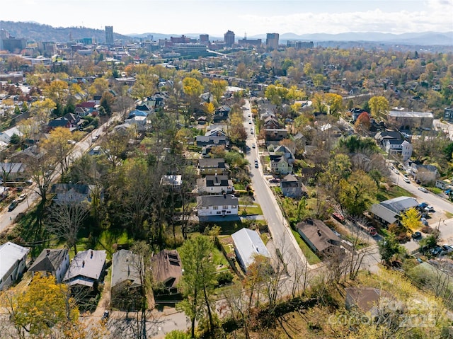 drone / aerial view featuring a mountain view