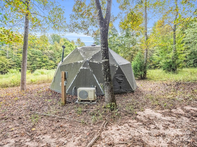 view of outdoor structure with ac unit