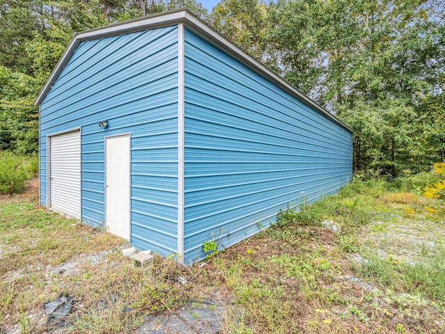 view of outdoor structure with a garage