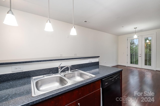 kitchen with black dishwasher, decorative light fixtures, dark hardwood / wood-style floors, and sink