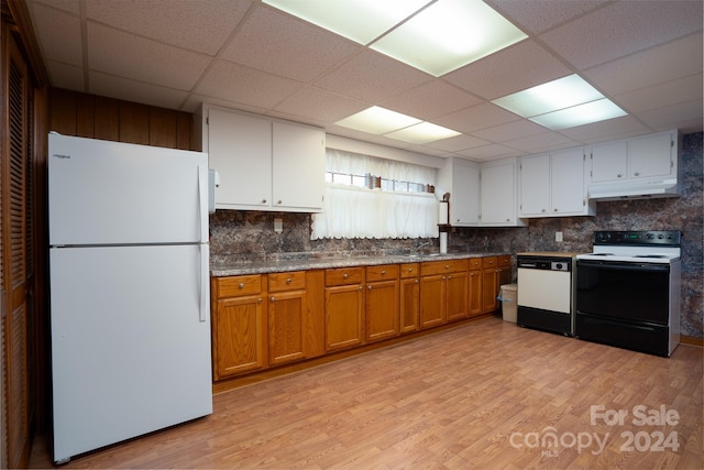 kitchen featuring a paneled ceiling, white appliances, white cabinets, and light hardwood / wood-style flooring