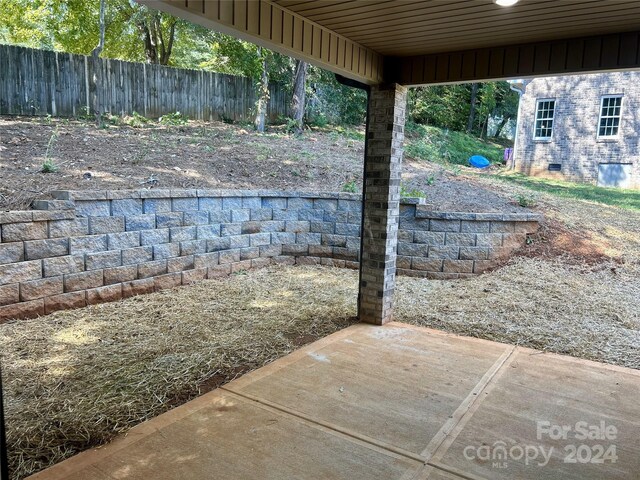 1243 10th Street Pl NW, Hickory, NC 28601 - view of patio featuring fence
