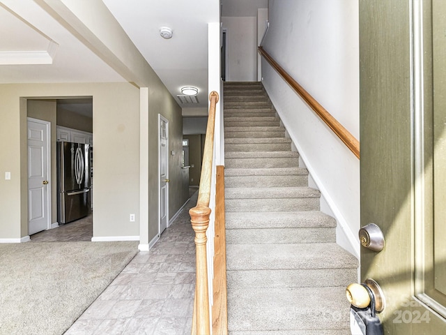 stairway with carpet floors