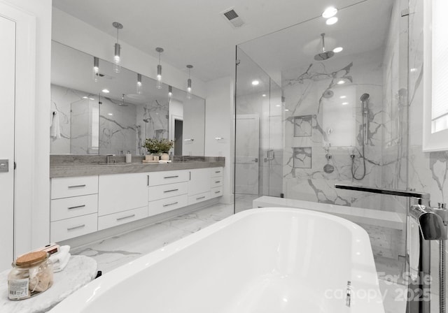 bathroom featuring plus walk in shower, tile walls, and vanity