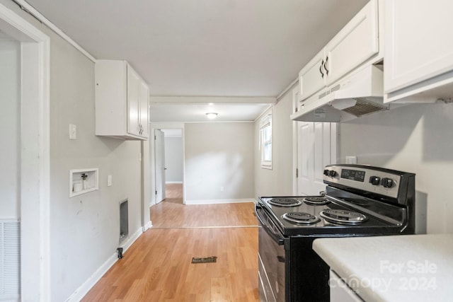 kitchen featuring exhaust hood, light hardwood / wood-style floors, white cabinets, and stainless steel electric range