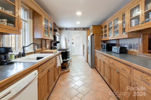 kitchen featuring appliances with stainless steel finishes and sink