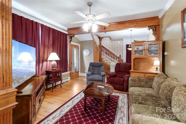 living room featuring light hardwood / wood-style floors, ceiling fan, a baseboard heating unit, and ornamental molding