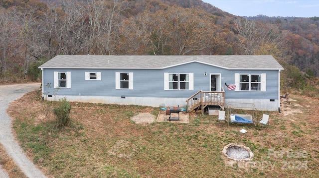 manufactured / mobile home featuring a deck