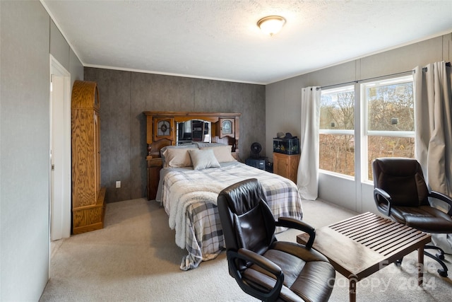 carpeted bedroom featuring a textured ceiling