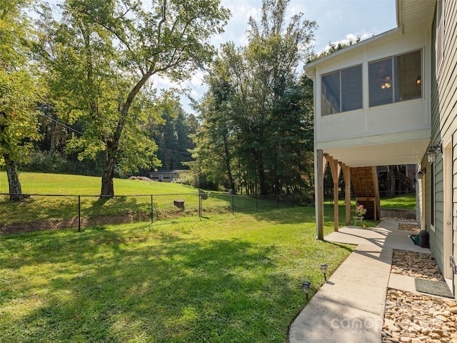 view of yard featuring a patio area and a fenced backyard