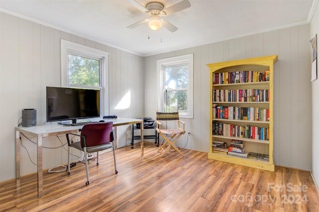 office space with ceiling fan, hardwood / wood-style flooring, crown molding, and a healthy amount of sunlight