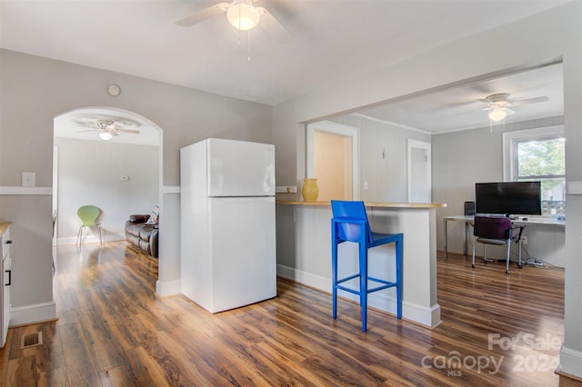 kitchen with dark wood-type flooring and white fridge