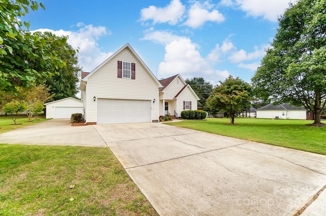 view of front property featuring a front yard and a garage