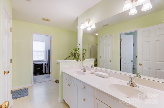 full bathroom with visible vents, a sink, baseboards, and double vanity