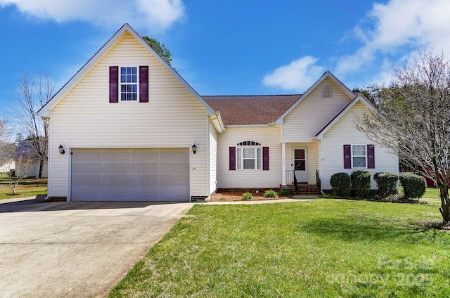 traditional-style home featuring a garage, driveway, roof with shingles, and a front yard