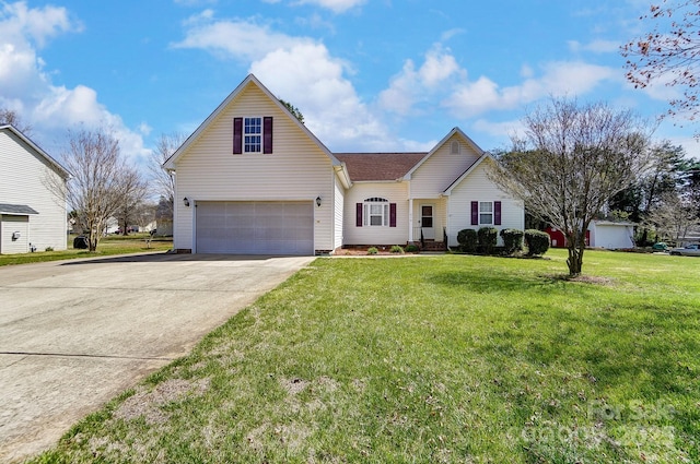 traditional home featuring an attached garage, a front yard, and concrete driveway