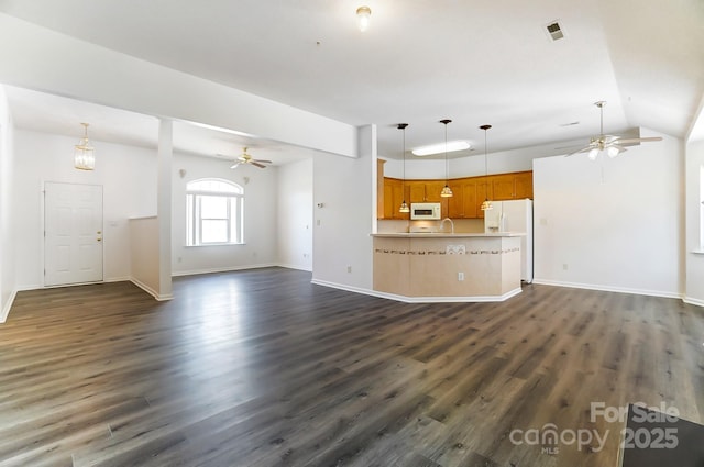 unfurnished living room featuring ceiling fan, baseboards, and dark wood-style floors