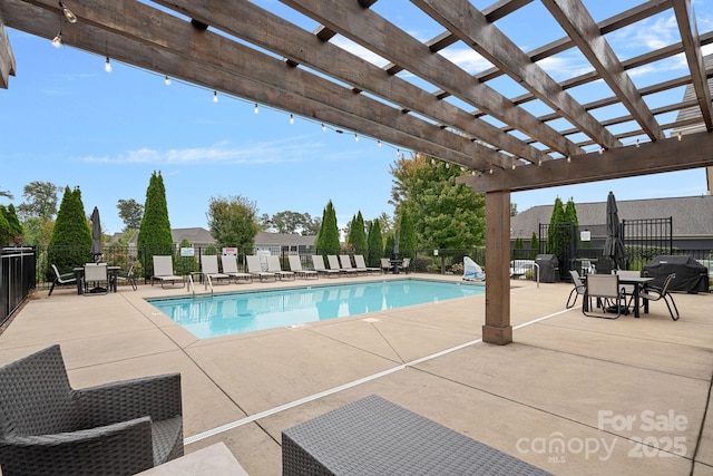 view of swimming pool featuring area for grilling, a pergola, and a patio