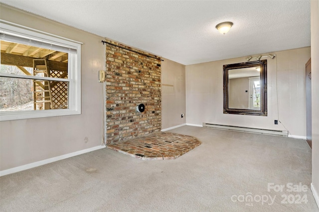 unfurnished living room featuring carpet, a textured ceiling, and a baseboard radiator