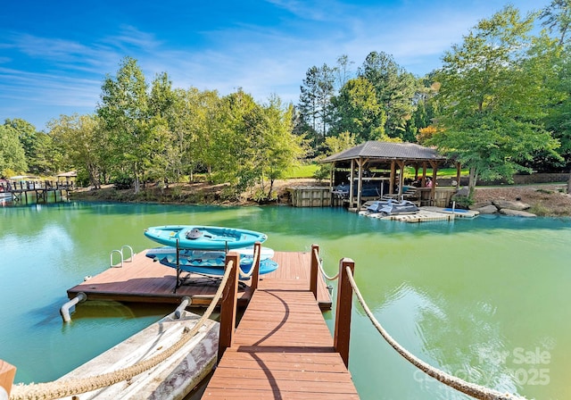 view of dock with a water view