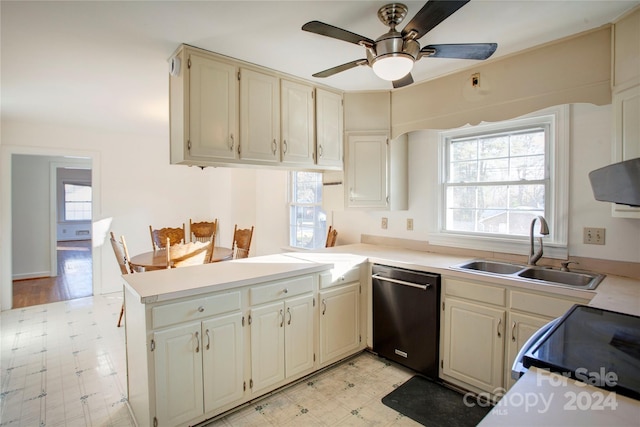 kitchen featuring stove, sink, stainless steel dishwasher, ceiling fan, and kitchen peninsula