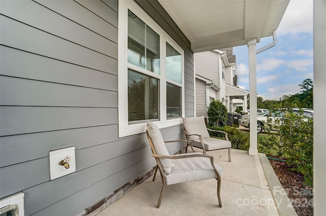 balcony featuring a porch