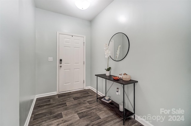 interior space with dark hardwood / wood-style flooring