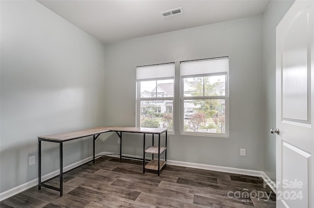 interior space with dark hardwood / wood-style floors